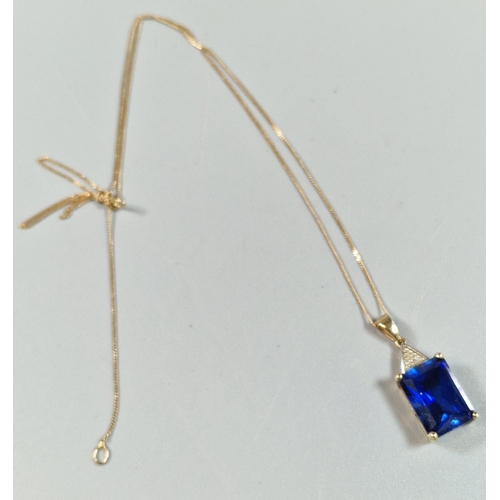 257 - 9ct gold fine link chain with large blue stone 9ct gold mounted pendant. 4g approx. (B.P. 21% + VAT)