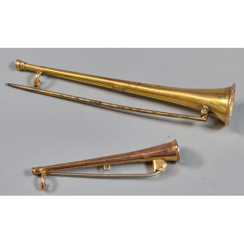 258 - Two 9ct gold hunting horn stock pins, the largest 7cm approx. 3.9g approx. (B.P. 21% + VAT)