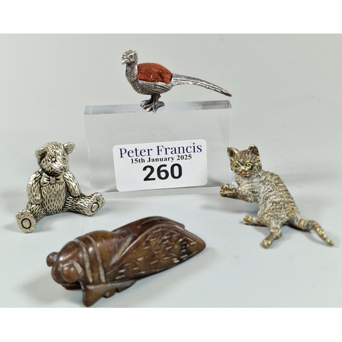 260 - Bag of oddments to include: silver plated pin cushion in the form of a pheasant, silver plated study... 