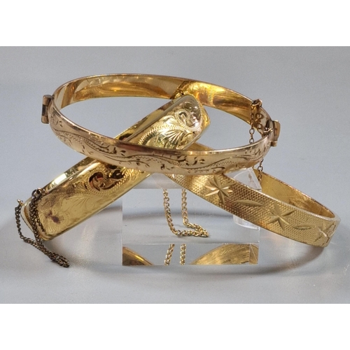 262 - Three rolled gold ladies bangles. (B.P. 21% + VAT)