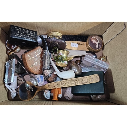 271 - Box of oddments to include: carved spoon marked Gwen, carved studies of frogs, German ceramic dolls,... 