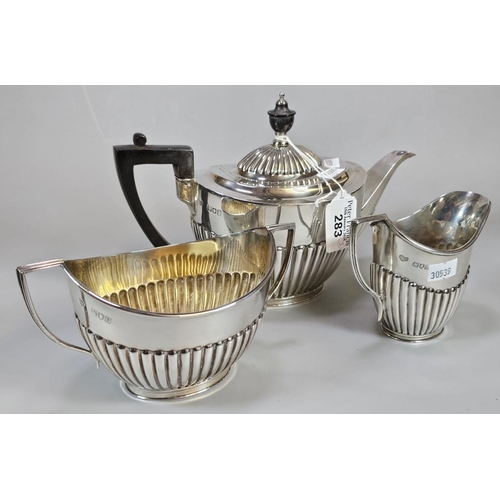 283 - Edward VII silver fluted three piece tea service, By G & S Co LD, two dated 1902, one dated 1899. 24... 