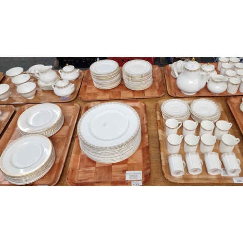 296 - Nine trays of Royal Doulton English fine bone china 'Gold Lace' HN4989, tea, dinner and coffee ware ... 