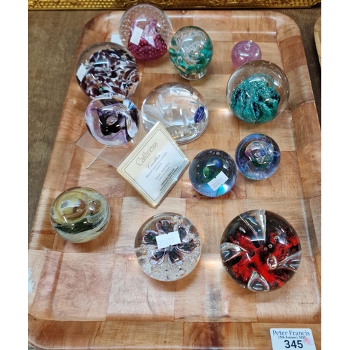 345 - Collection of glass paperweights to include: Caithness, Royal Doulton, Liskeard etc. (12) (B.P. 21% ... 