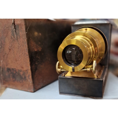 357 - 19th century Magic Lantern projector with gilt brass lens, oxidised metal body and original metal ca... 