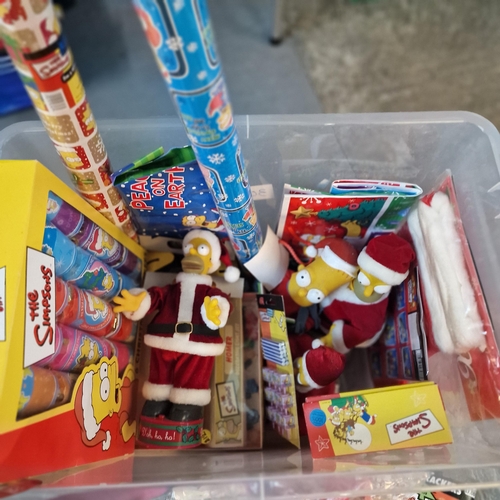 409 - Large collection of The Simpsons Christmas related items to include: crackers, wrapping paper, candl... 