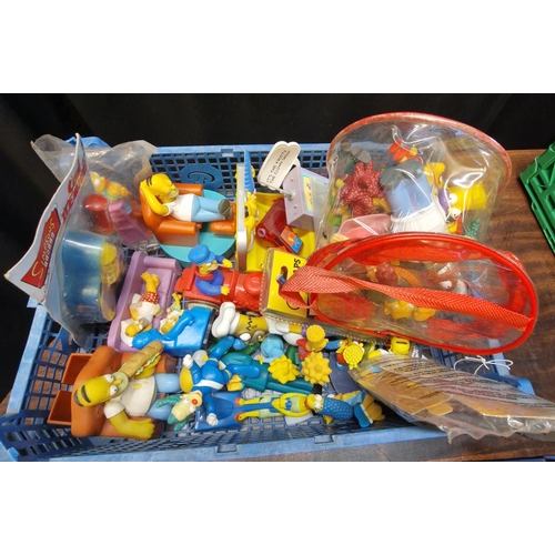 416 - Seven trays of assorted Simpsons figures, various characters, air fresheners, Duff Beer Can AM/FM Ra... 