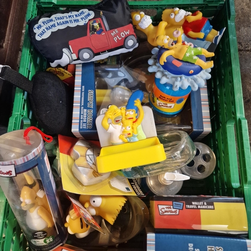 419 - Plastic box of The Simpsons accessories to include: toiletry gift set,  deodorant Simply Homer, wall... 