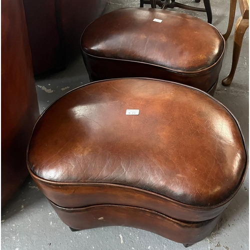 457 - Art Deco style tan leather kidney shaped three piece suite comprising: two seater sofa and pair of a... 