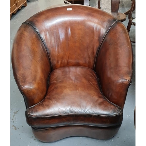 457 - Art Deco style tan leather kidney shaped three piece suite comprising: two seater sofa and pair of a... 