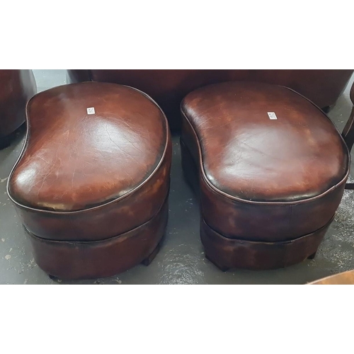 457 - Art Deco style tan leather kidney shaped three piece suite comprising: two seater sofa and pair of a... 