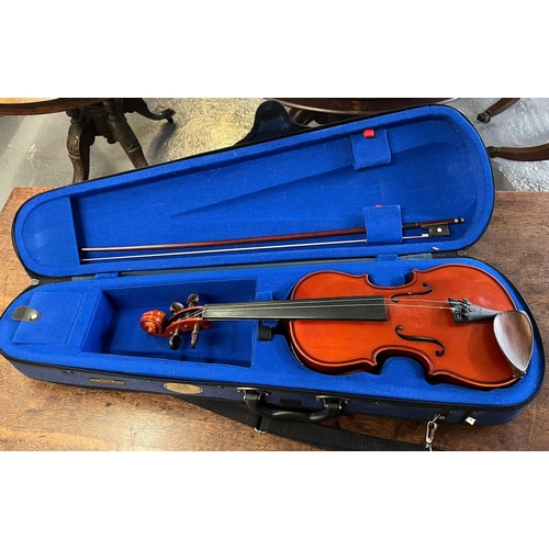 463 - Modern cased student violin, marked to the inside Stentor Music Co Ltd. with bow. Together with stud... 