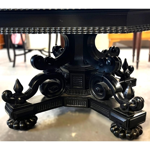 482 - 19th century stained/ebonised octagonal centre table, the base carved in ornate Oriental designs. 12... 