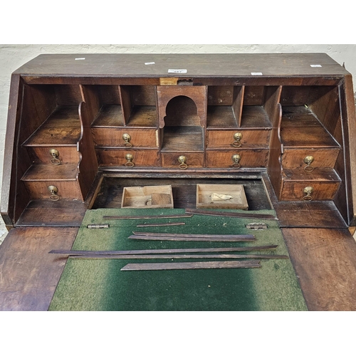 487 - Rare 18th century mahogany bureau of notably small proportions having fall front, stepped interior w... 