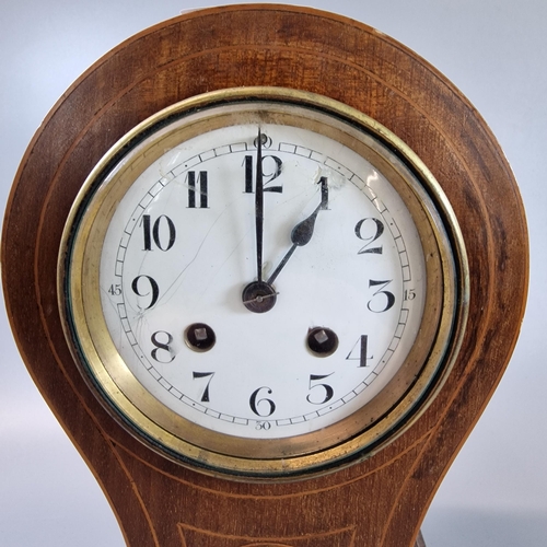 96 - Edwardian inlaid mahogany balloon shaped boudoir clock with white Arabic face and two train movement... 