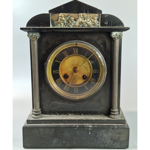 99 - Early 20th century black slate architectural mantel clock, with two train movement. 29cm high approx... 