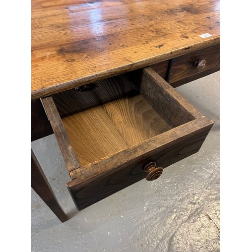 443 - 19th century elm farmhouse table, the moulded and shaped top above three drawers with turned handles... 