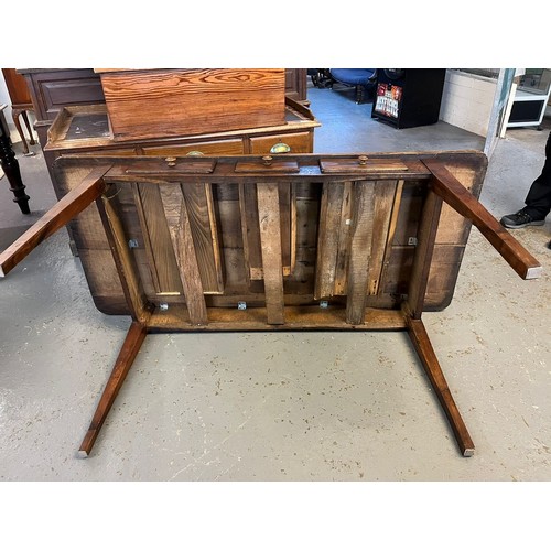 443 - 19th century elm farmhouse table, the moulded and shaped top above three drawers with turned handles... 