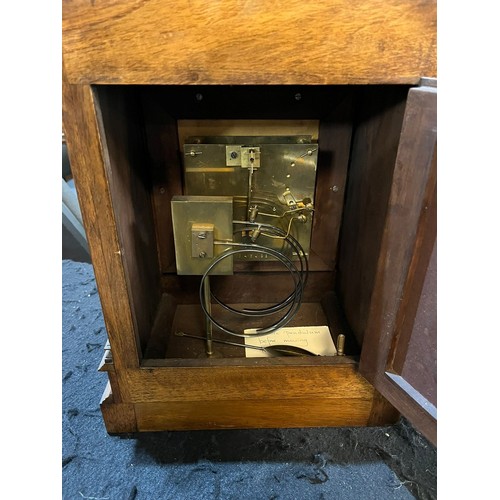 91 - Early 20th century German walnut cased architectural mantel clock with brass face, having Roman silv... 