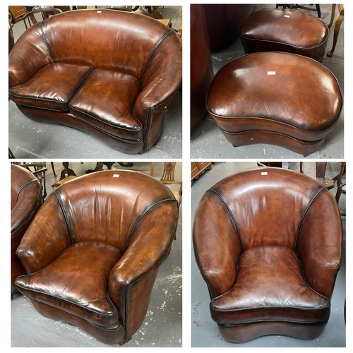 513 - Art Deco style tan leather kidney shaped three piece suite comprising: two seater sofa and pair of a...