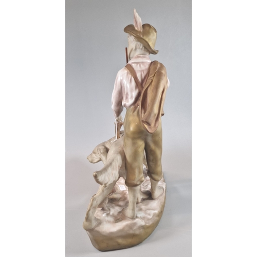 1 - Early 20th century Royal Dux figure group of young boy with hunting dog and lead, on naturalistic ba... 