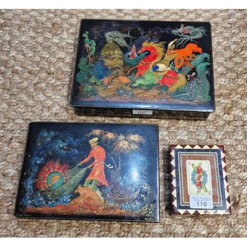 110 - Two modern lacquered Russian boxes, both signed and depicting mythical creatures and figures, togeth... 