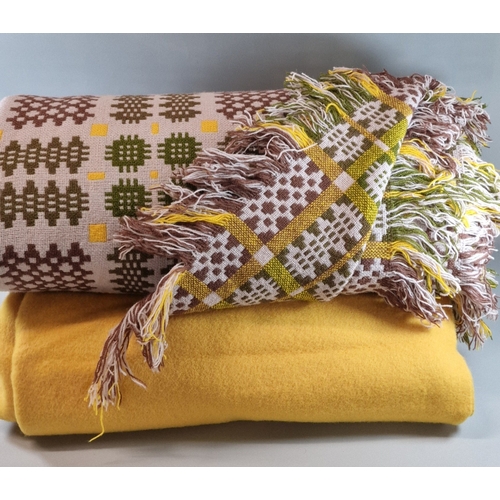 130 - Vintage mauve ground geometric Welsh carthen, together with a mustard blanket. (2) (B.P. 21% + VAT)