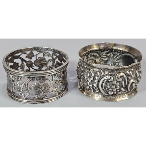 179 - Pair of Victorian repoussé salts on ball feet. 3.5 troy oz approx. Together with two silver napkin r... 