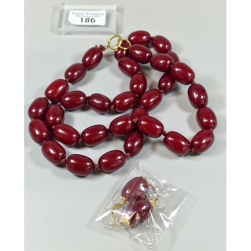 186 - Cherry coloured beaded necklace with pair of matching earrings. (B.P. 21% + VAT)