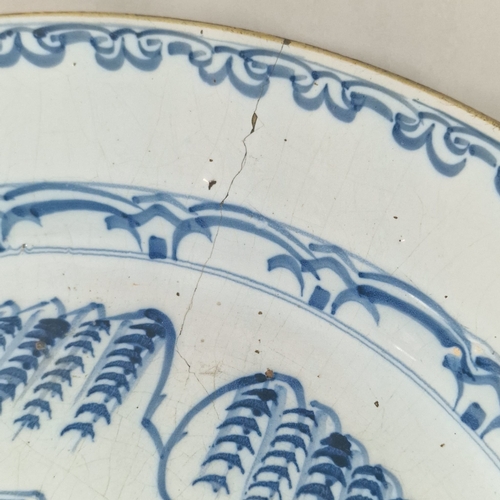 2 - Early 18th century English Delft pottery chinoiserie style blue and white plate, decorated with a fi... 