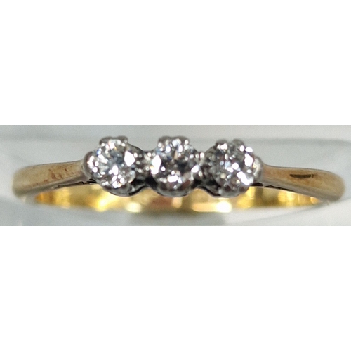 201 - 18ct gold and platinum diamond three stone ring, in fitted box. 2g approx. Size M. (B.P. 21% + VAT)