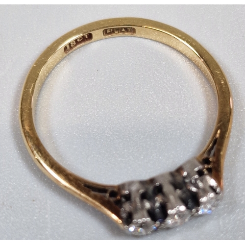 201 - 18ct gold and platinum diamond three stone ring, in fitted box. 2g approx. Size M. (B.P. 21% + VAT)