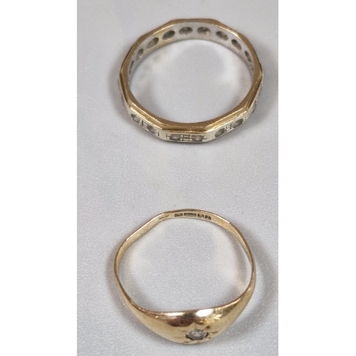 202 - 9ct gold ring inset with tiny diamond chip. Ring size I1/2. Together with a 9ct gold eternity style ... 