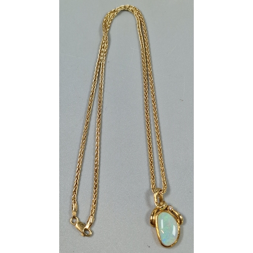 217 - 18ct gold necklace with opal pendant and inset tiny diamond chip. 9.4g approx. (B.P. 21% + VAT)