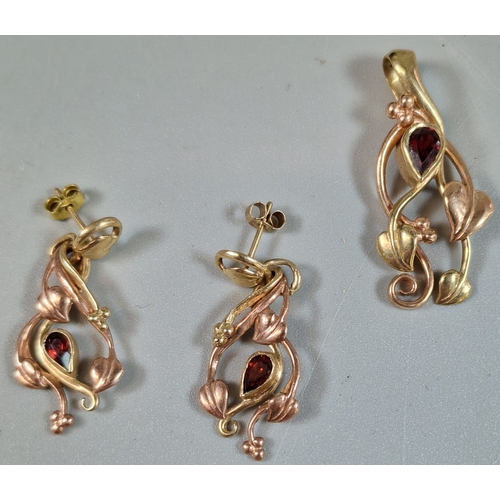 220 - Pair of 9ct Clogau gold earrings inset with semi precious red stone and a matching Clogau pendant. 7... 