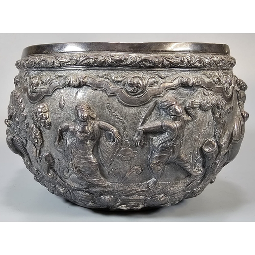 251 - Indian/Burmese white metal bowl, highly decorated in relief figures, animals including elephants, ra... 