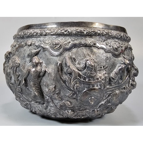 251 - Indian/Burmese white metal bowl, highly decorated in relief figures, animals including elephants, ra... 