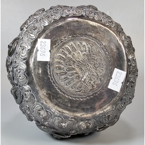 251 - Indian/Burmese white metal bowl, highly decorated in relief figures, animals including elephants, ra... 