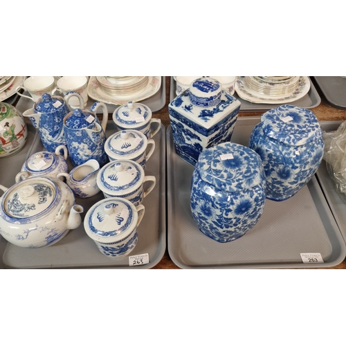 263 - Three trays of ceramics to include: reproduction  blue and white foliate jars and covers, Ringtons t... 