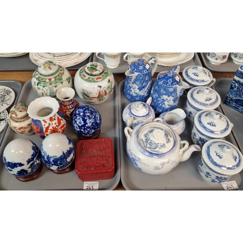 263 - Three trays of ceramics to include: reproduction  blue and white foliate jars and covers, Ringtons t... 