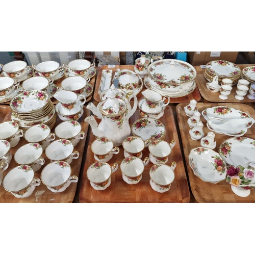 296 - Nine trays of Royal Albert bone china 'Old country Roses' design tea and dinner ware items to includ... 