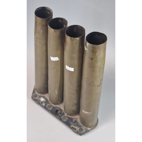 35 - 40mm BOFORS clip with '4' brass shells. Shell marked '40x365DM2' and 'LOS DN-2-29' Clip marked with ... 