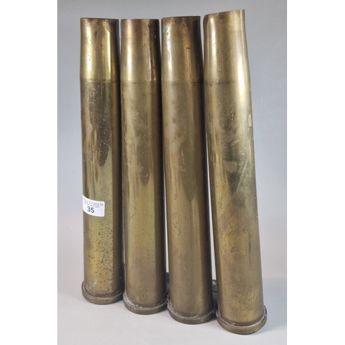 35 - 40mm BOFORS clip with '4' brass shells. Shell marked '40x365DM2' and 'LOS DN-2-29' Clip marked with ... 