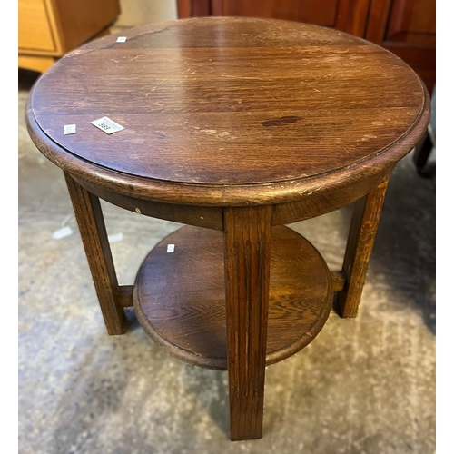 589 - Art Deco design oak circular two tier occasional/lamp table. (B.P. 21% + VAT)