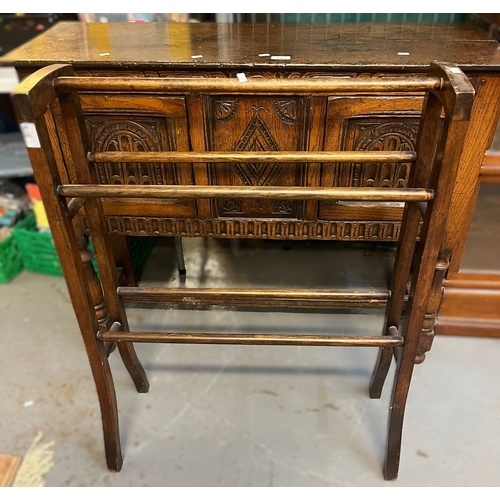 615 - 17th century style carved oak sideboard, together with an early 20th century stained towel rail. (2)... 