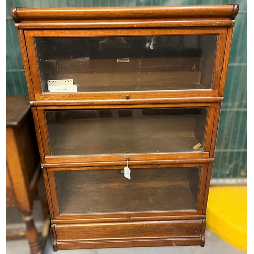 617 - Early 20th century mahogany Globe Wernicke three sectional bookcase, with metal banding. 87x31x126cm... 