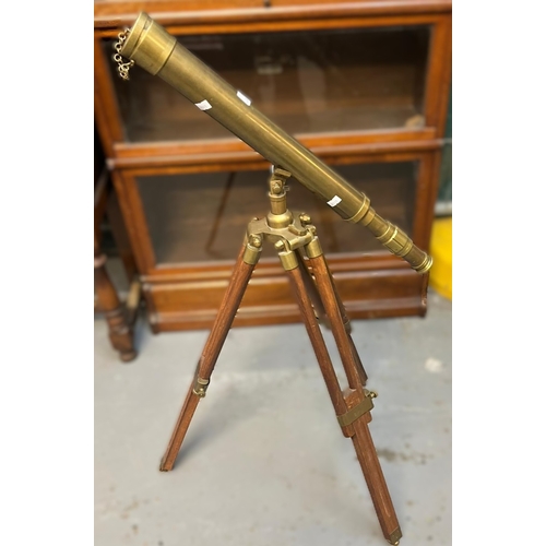 618 - Reproduction brass telescope on tripod folding stand. (B.P. 21% + VAT)