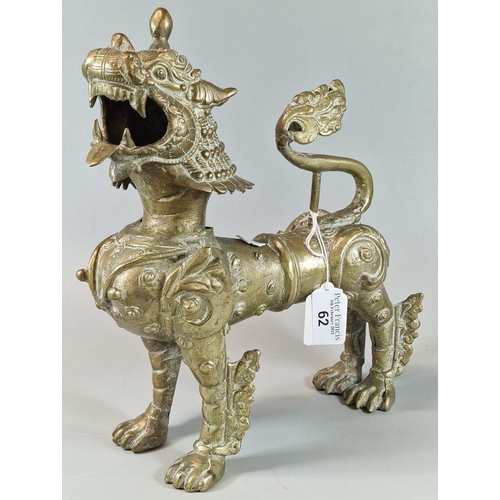 62 - Cast metal brass Burmese style Temple Guardian Lion. 28cm high approx. (B.P. 21% + VAT)