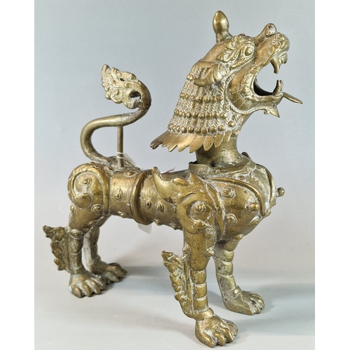 62 - Cast metal brass Burmese style Temple Guardian Lion. 28cm high approx. (B.P. 21% + VAT)