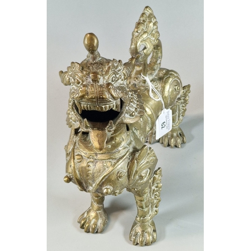 62 - Cast metal brass Burmese style Temple Guardian Lion. 28cm high approx. (B.P. 21% + VAT)